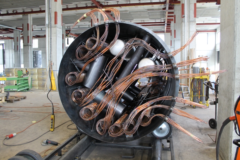 Speicher mit integrierten Wärmetauschern für Wärmerückgewinnung aus Kühlanlagen